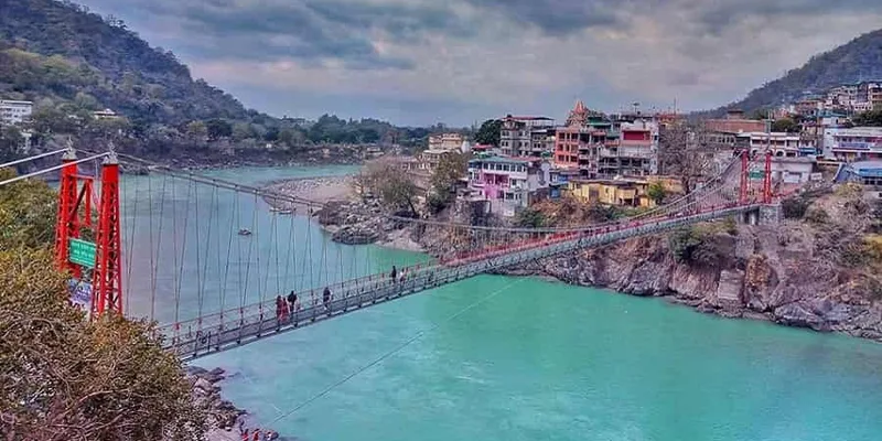 Laxman Jhula suspension bridge over the Ganga at Rishikesh, visited on the Haridwar and Rishikesh yatra
